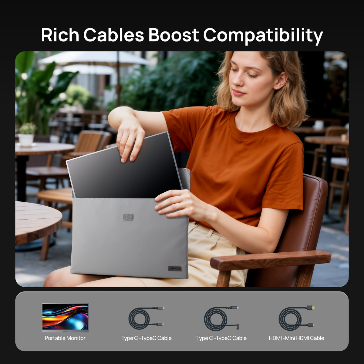 A woman packing her ARZOPA Z1C grey portable monitor with standard Type-C and HDMI accessories included.
